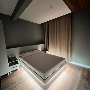 Kamer met een Queen Size Bed